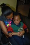 Akin and his mother.  They were detained for 49 days.
